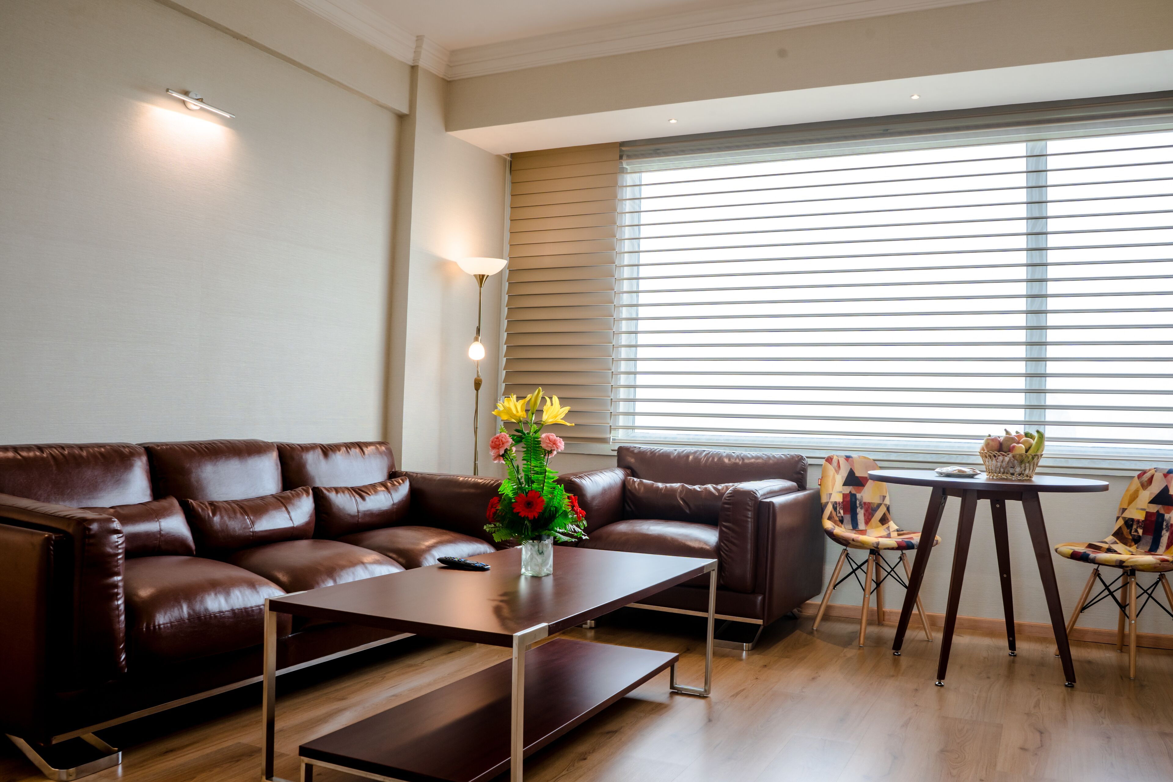 Luxury Suite | Living area | 42-inch LED TV with cable channels, TV