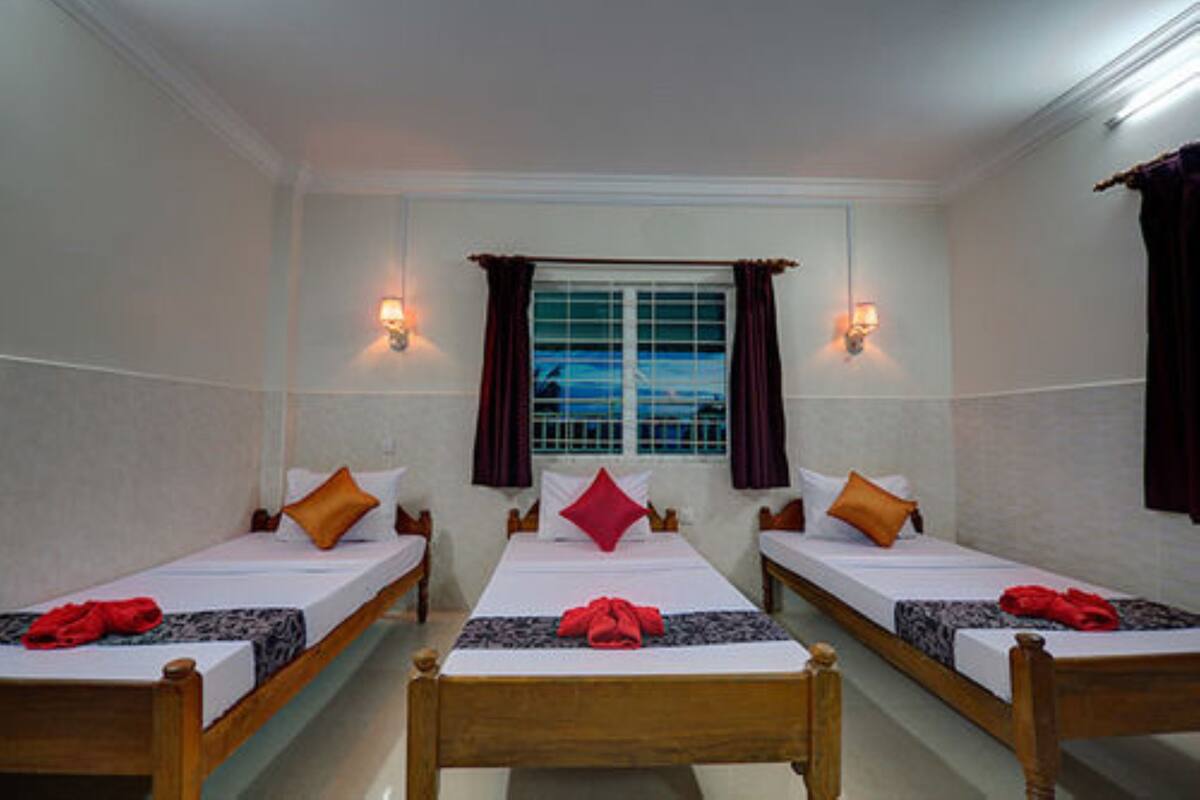 Standard Triple Room, 3 Twin Beds | In-room safe, WiFi (free), bed sheets