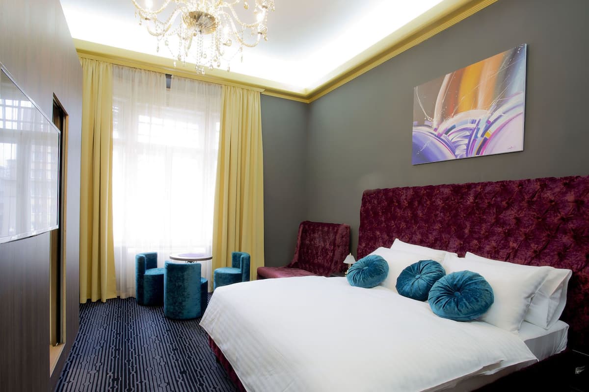 Premium bedding, in-room safe, desk, iron/ironing board (on request)