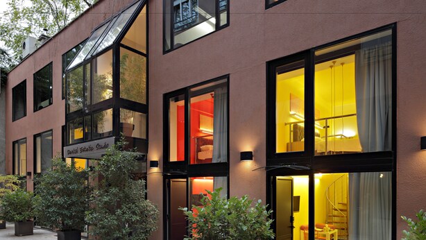 A modern building with large windows and a sign for a dental esthetic studio. - Residence Park (Zagreb)