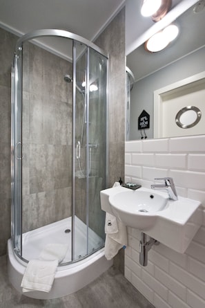 Shower, free toiletries, hair dryer, towels