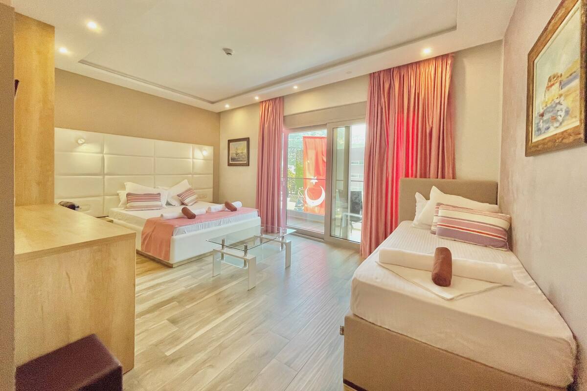 Standard Triple Room, Balcony | Minibar, in-room safe, desk, soundproofing