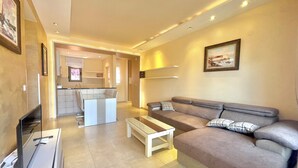Luxury Apartment, 2 Bedrooms | Living area | 42-inch flat-screen TV with cable channels, TV - Butua Residence (Budva)
