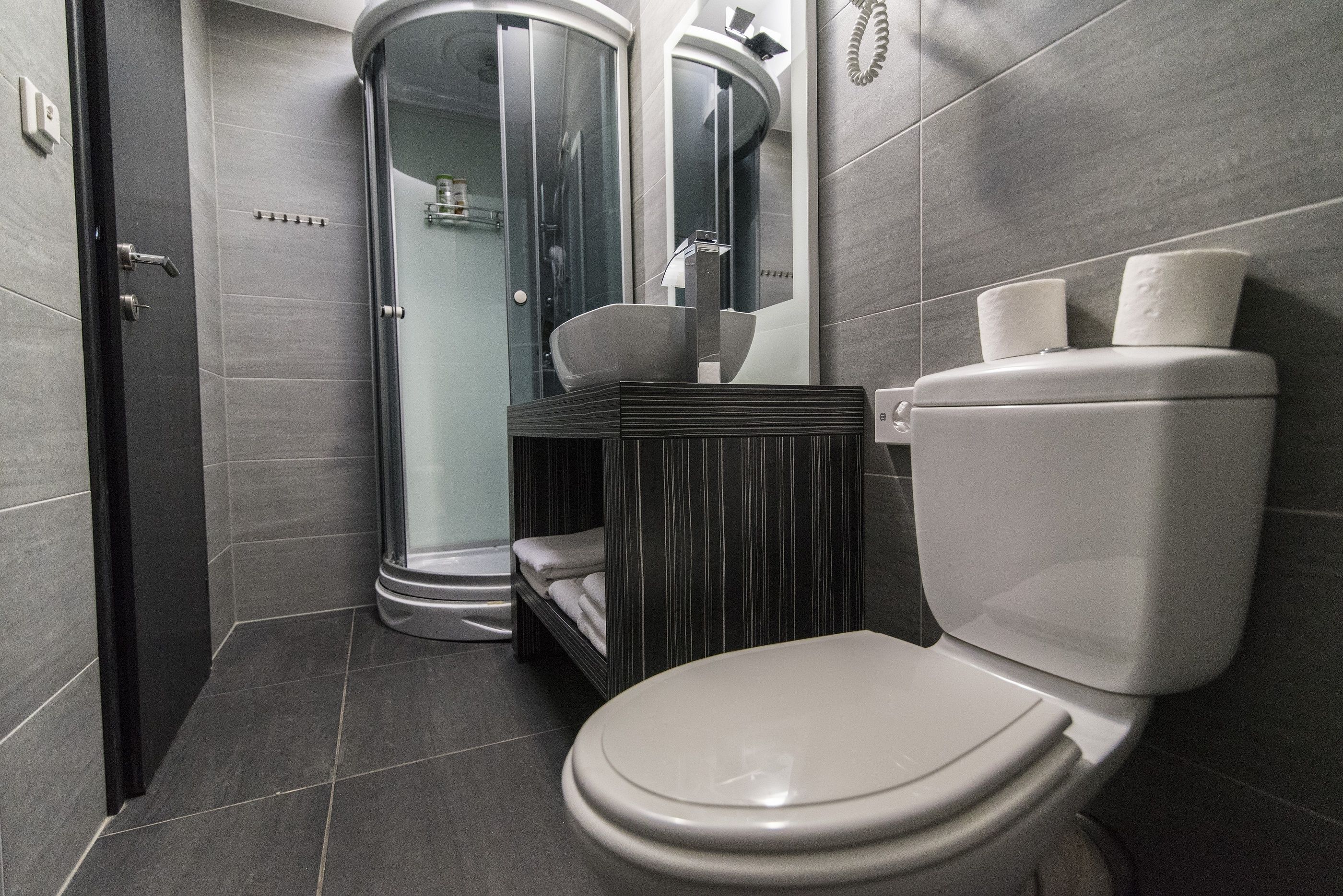 comfort triple room | bathroom | shower, free toiletries, hair dryer, towels