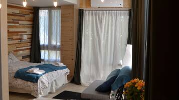 Studio | Premium bedding, desk, blackout drapes, iron/ironing board