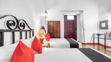 Habitación estándar, 2 camas matrimoniales | Insonorización, tabla de planchar con plancha y wifi gratis