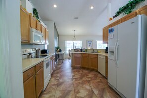 Villa, 3 Bedrooms, Patio (North Timucuan Trail Villa 1208) | Private kitchen | Microwave, oven, toaster, cookware/dishes/utensils