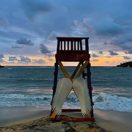 On the beach, sun loungers