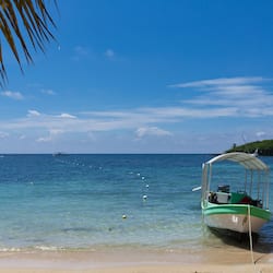 On the beach, sun-loungers
