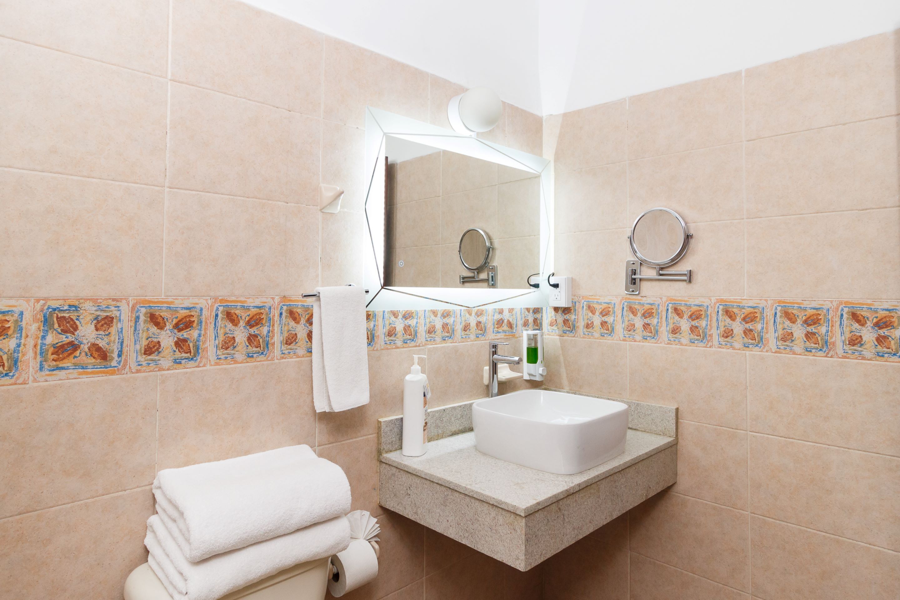 comfort room, 1 king bed | bathroom | shower, free toiletries, hair dryer, towels