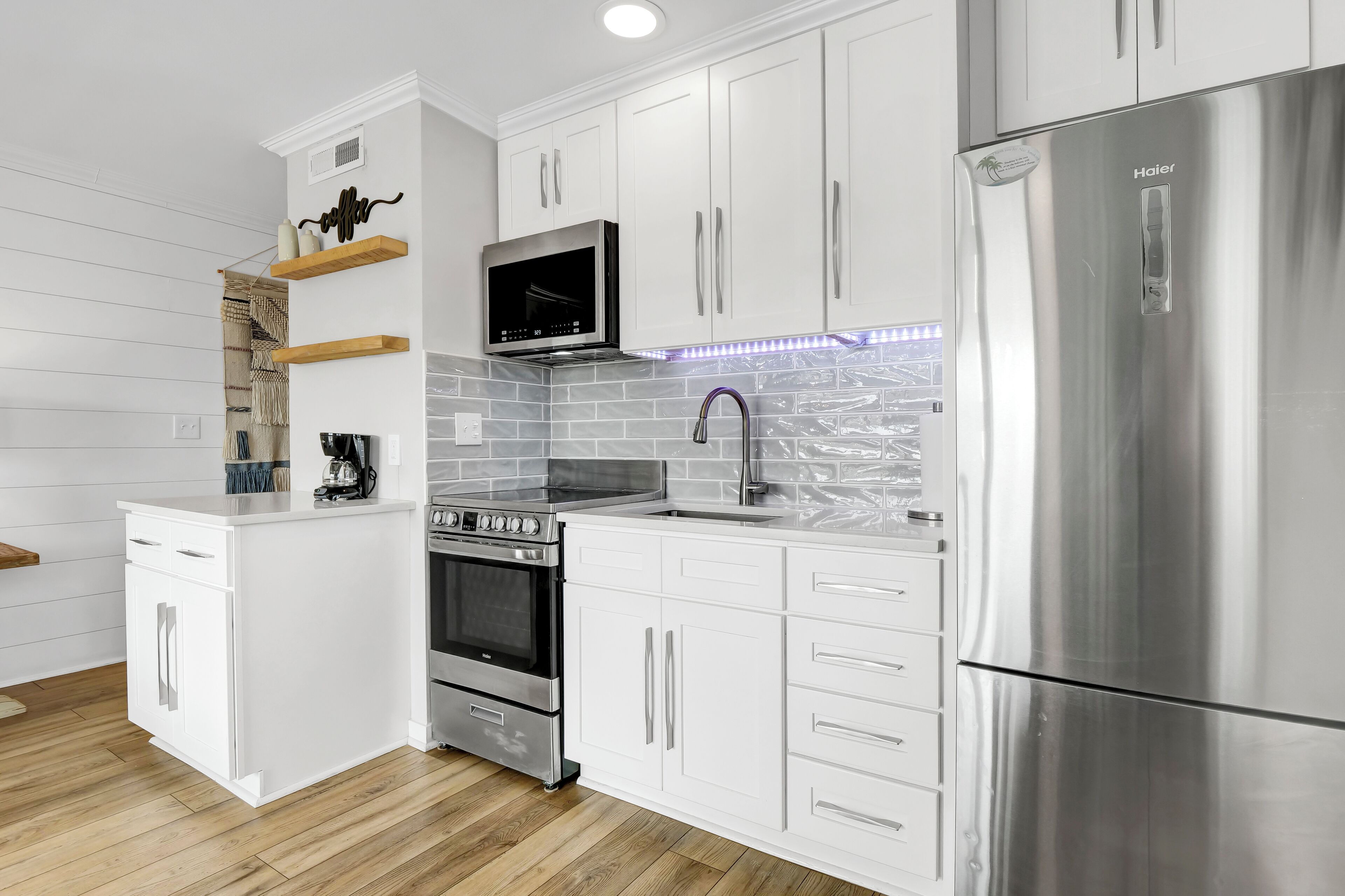 exclusive suite, 1 king bed with sofa bed, kitchen, ocean view | private kitchen | fridge, microwave, stovetop, coffee/tea maker