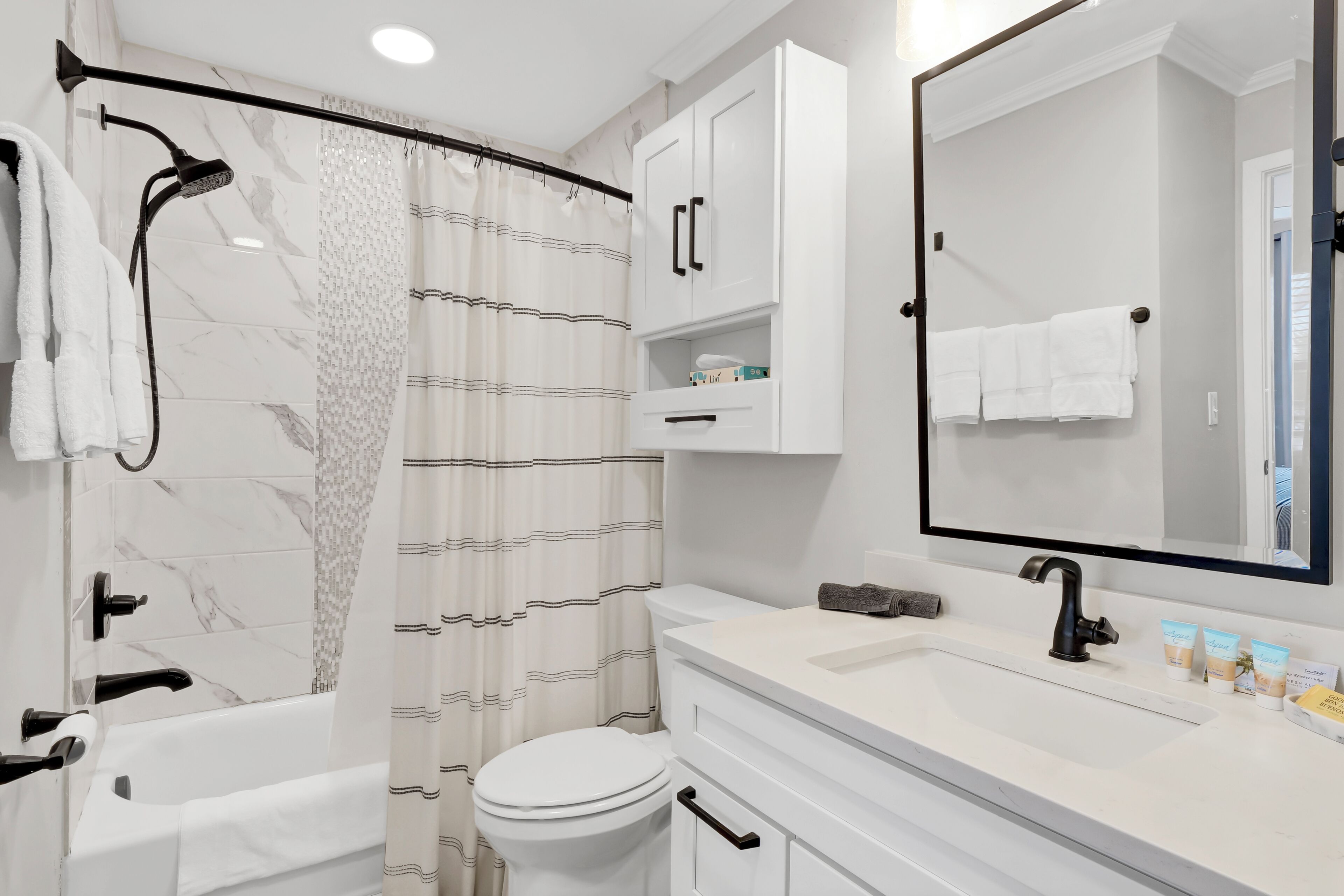 exclusive suite, 1 king bed with sofa bed, kitchen, ocean view | bathroom | combined shower/bathtub, free toiletries, towels, soap