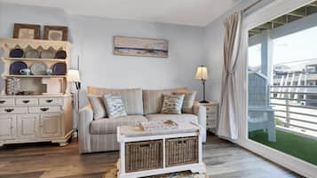 Exclusive Suite, 1 King Bed with Sofa bed, Kitchen, Ocean View | Living area | Flat-screen TV