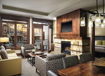 43-inch flat-screen TV with cable channels, TV, fireplace at One Village Place Residences, Lake Tahoe