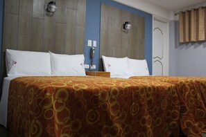 Habitación ejecutiva, 2 camas matrimoniales | Wifi gratis y ropa de cama 