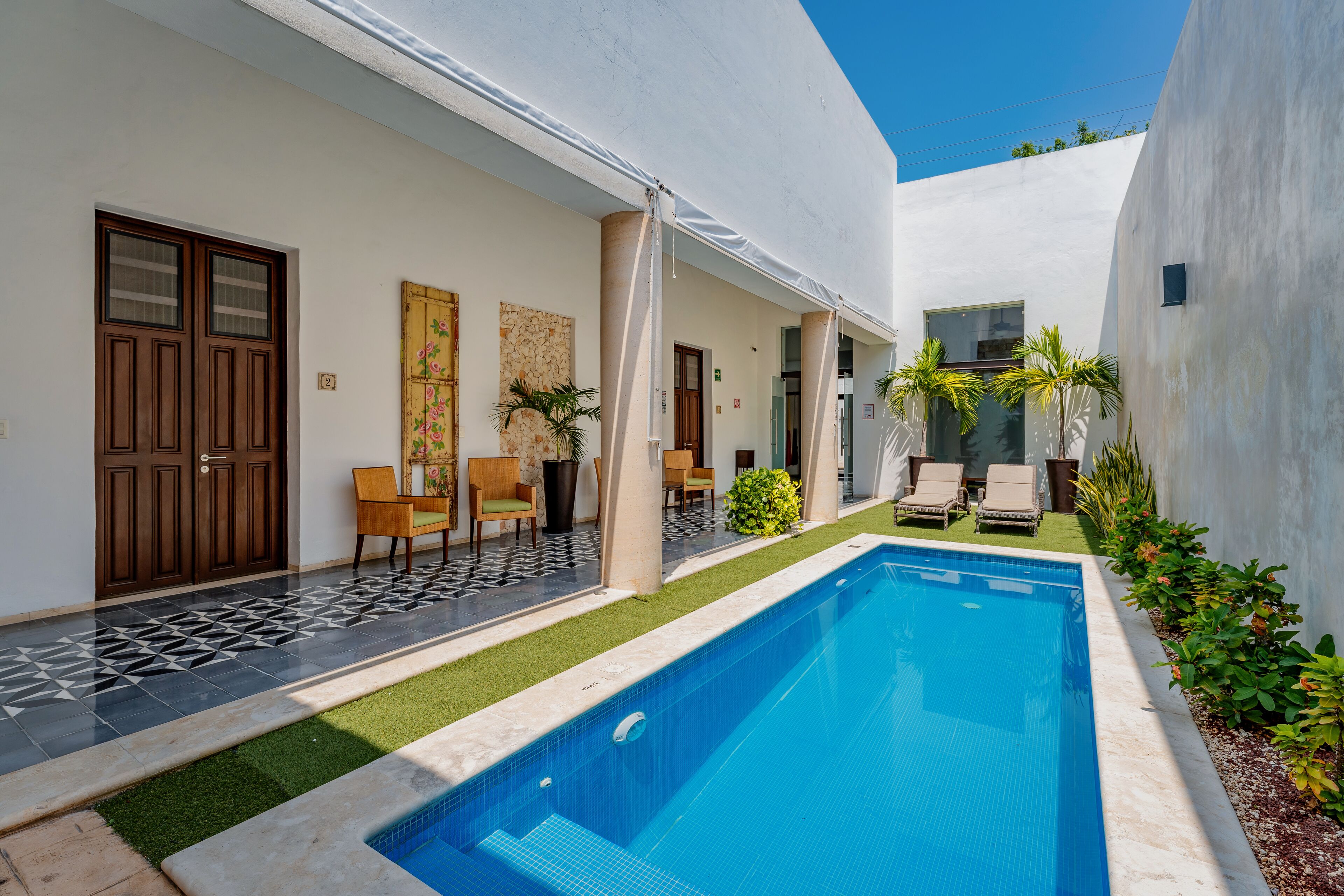 Outdoor pool, open 8 AM to 9 PM, sun loungers