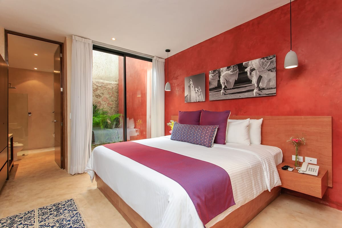 Deluxe Room, 1 King Bed | Premium bedding, in-room safe, iron/ironing board (on request)