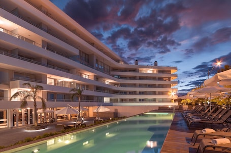 Indoor pool, seasonal outdoor pool, open 8 AM to 8:30 PM, pool umbrellas. Dazzler by Wyndham Colonia