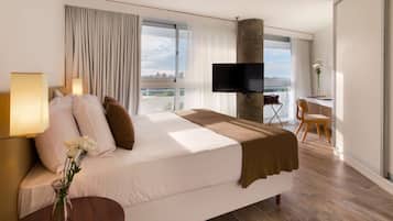 Suite, 1 King Bed, City View | 1 bedroom, in-room safe, desk, blackout curtains