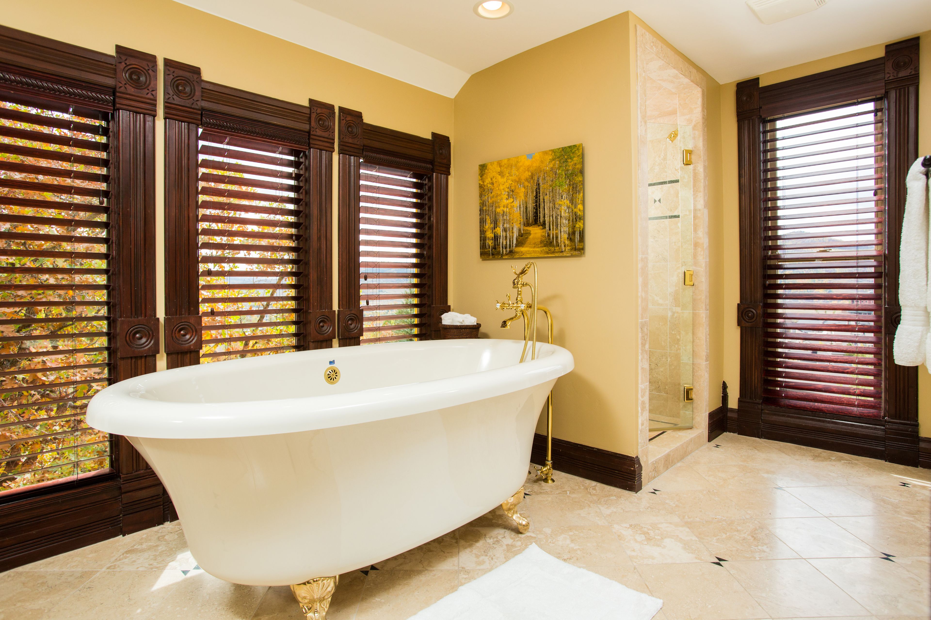 romantic suite, 1 king bed, fireplace, mountain view | deep-soaking bathtub