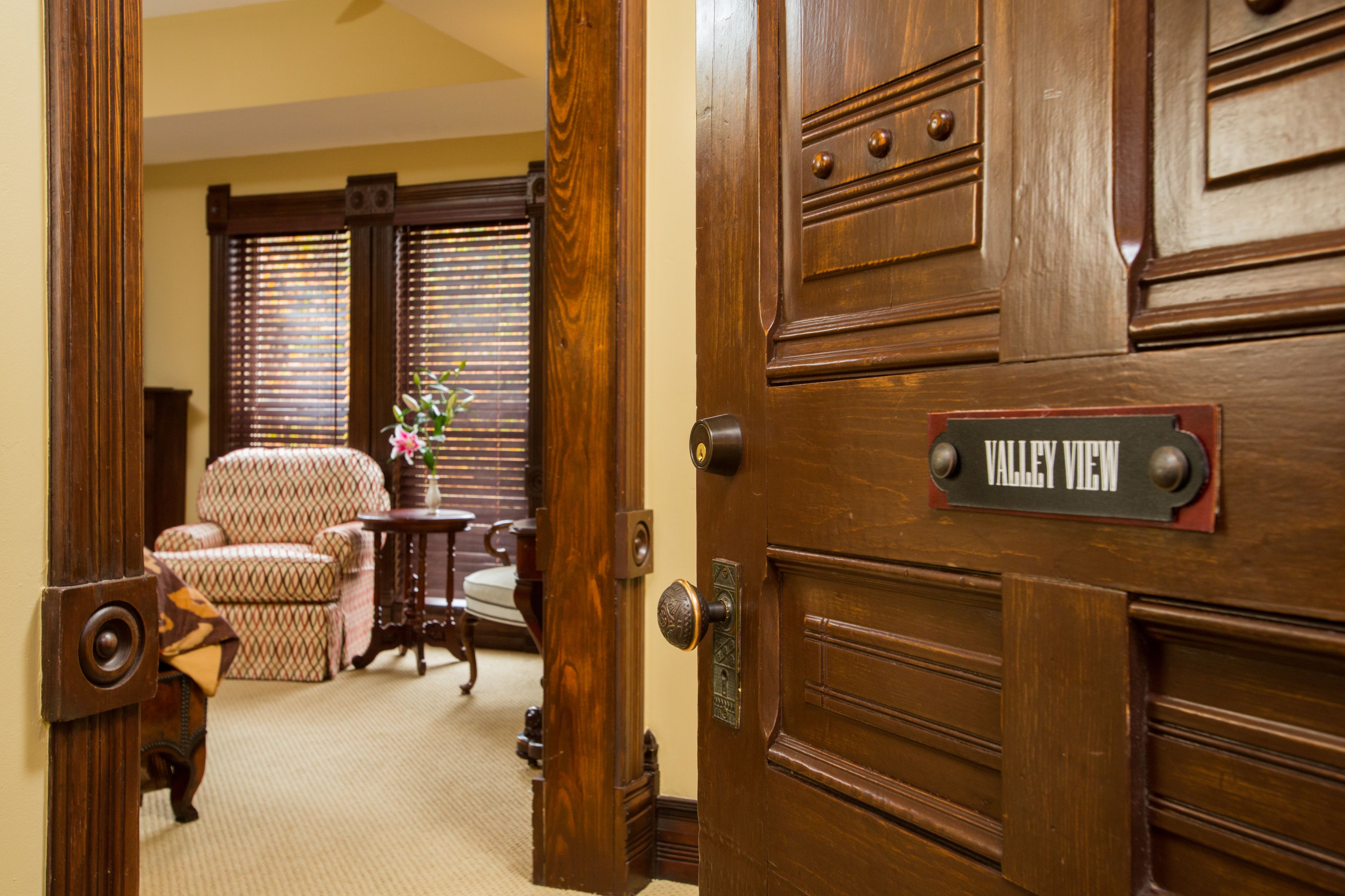 romantic suite, 1 king bed, fireplace, mountain view | living area | flat-screen tv, fireplace, pay films