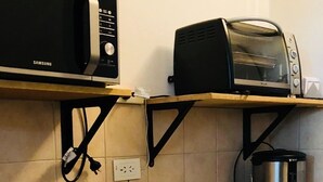 Basic Quadruple Room, 1 Bedroom | Private kitchenette | Fridge - The Loft Hotel (Buenos Aires)