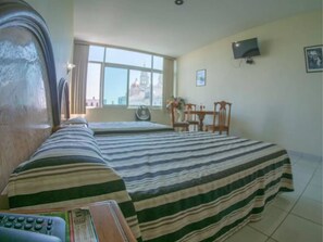 Chambre Standard, Plusieurs lits | Accès au Wi-Fi (inclus), literie fournie