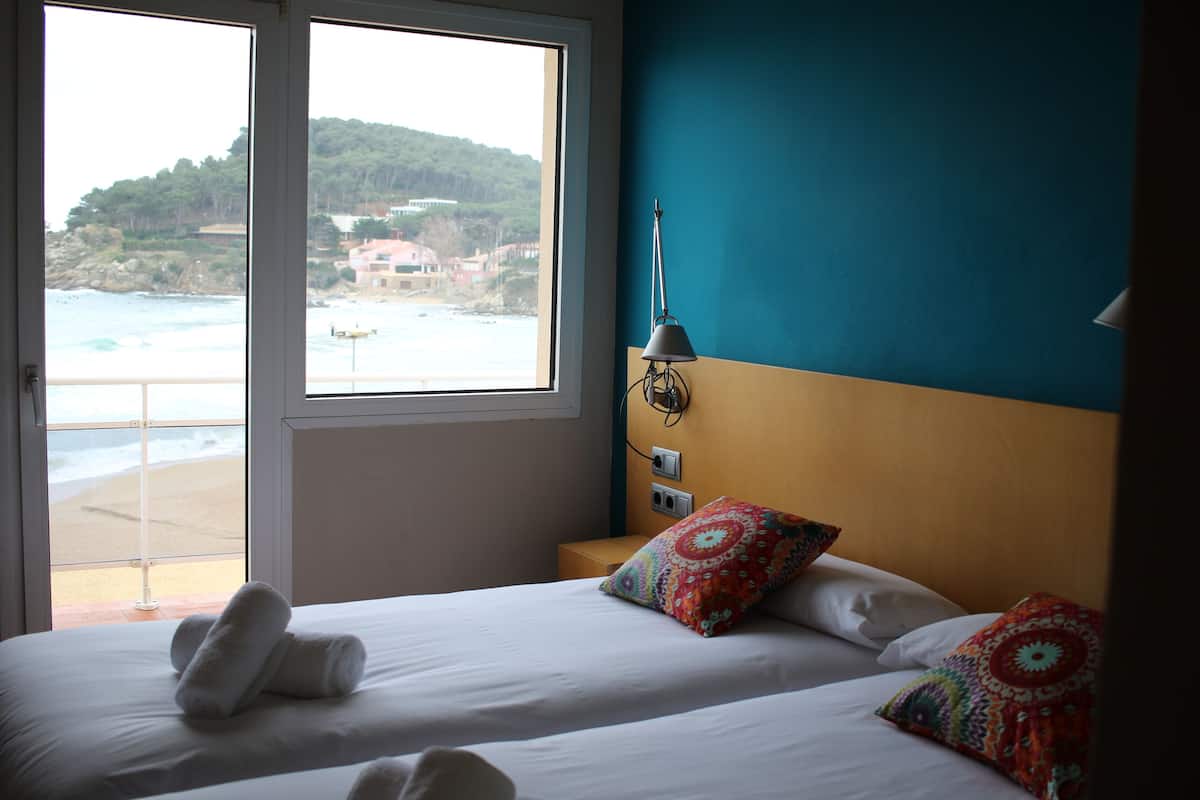 Desk, blackout curtains, free cots/infant beds, free WiFi