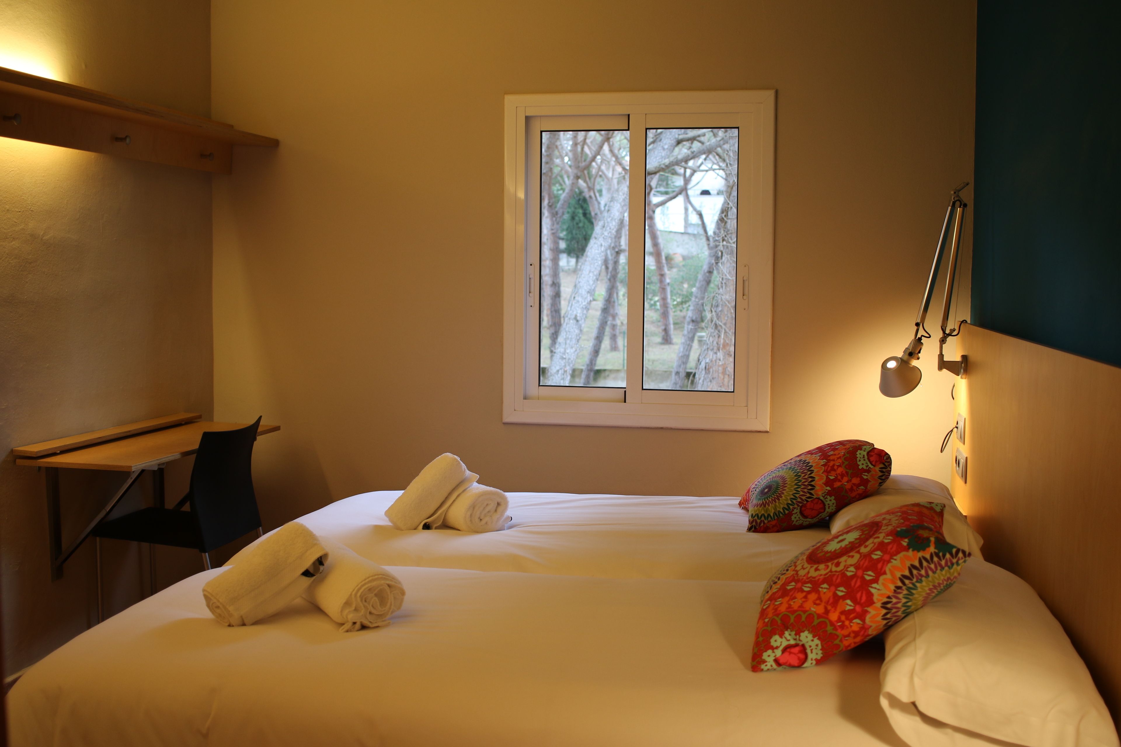 Desk, blackout curtains, free cots/infant beds, free WiFi