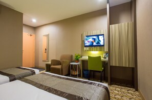 Kamar Triple | Minibar, meja kerja, kedap suara, dan tempat tidur lipat/tambahan
