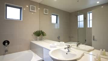 Superior Suite, 1 King Bed, Balcony | Bathroom | Shower, free toiletries, hair dryer, towels