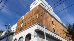 A building with a sign reading "IMALE". - Hotel Imalle Yokohama Isezakicho - Hostel (Yokohama)