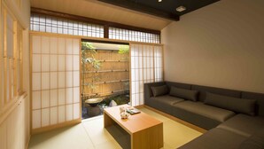 Suite | Living area | LCD TV - Resi Stay Gion Shijo (Kyoto)