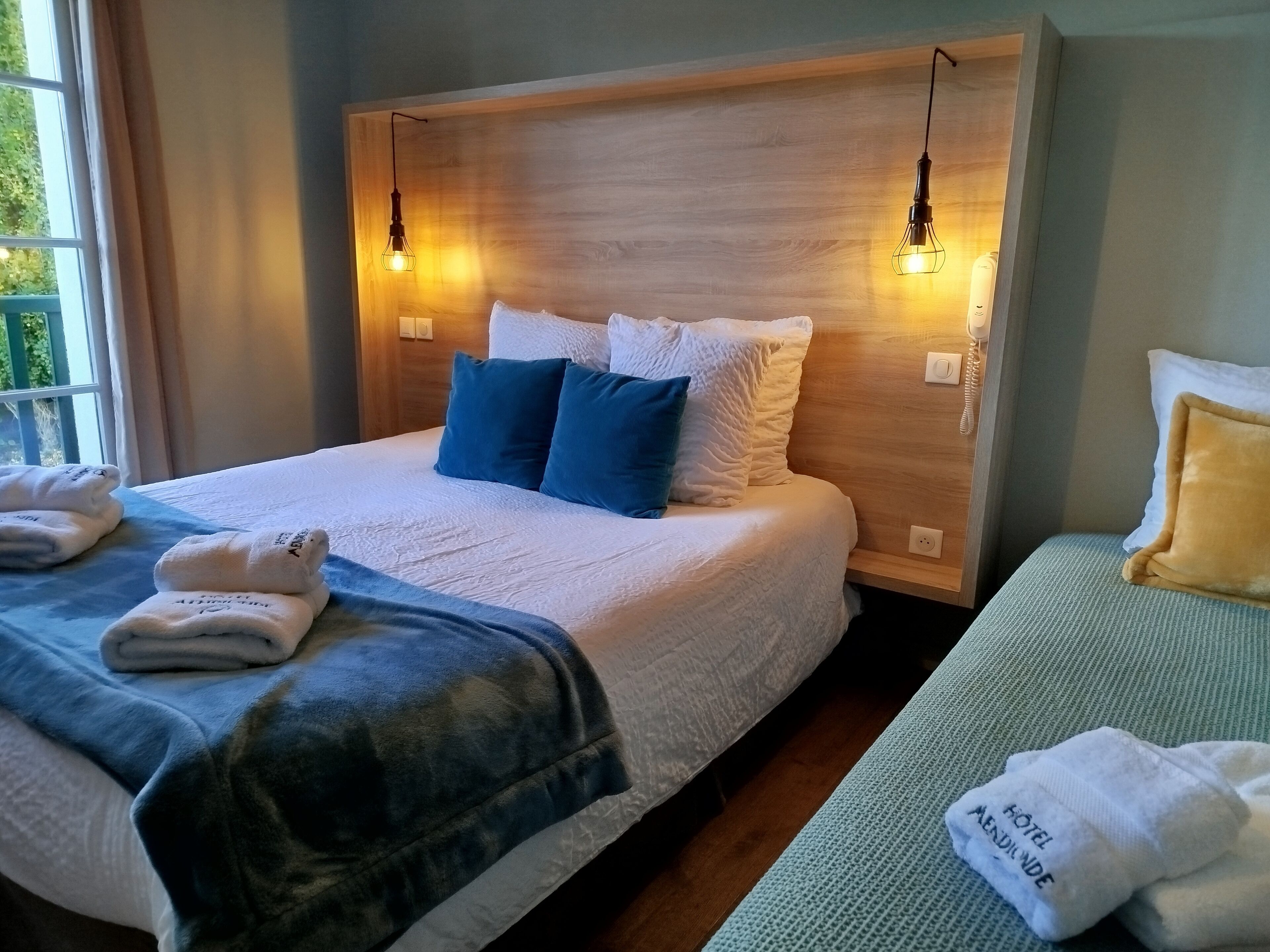 Comfort Quadruple Room | Iron/ironing board, free WiFi, bed sheets