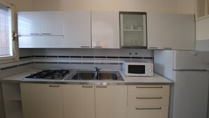 Apartment, 2 Bedrooms | Private kitchen - Letizia (Lignano Sabbiadoro)