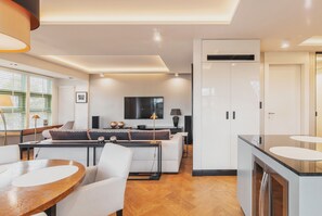 Apartamento Premium | Sala de estar | Una televisión de pantalla plana
