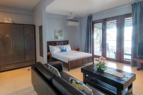 Studio, 1 Bedroom, Balcony, Ocean View | Living area | 32-inch TV with cable channels