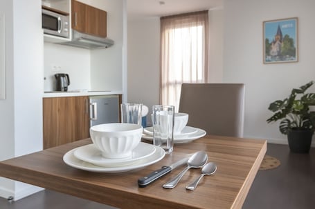 Standard Studio (2 People) | Desk, laptop workspace, soundproofing, free cribs/infant beds