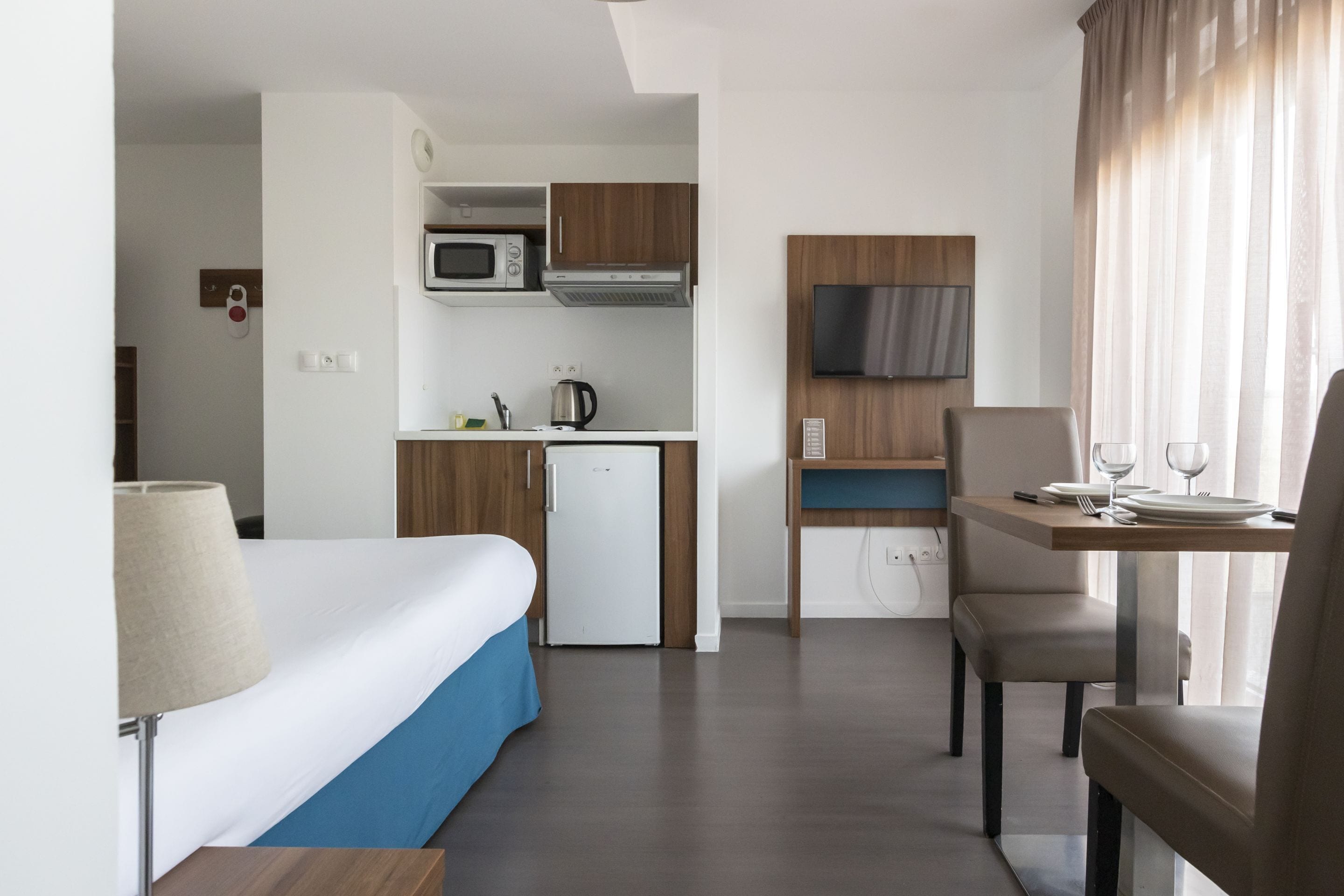 Standard Studio (2 People) | Desk, laptop workspace, soundproofing, free cribs/infant beds