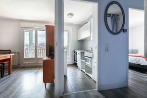 Superior Apartment | Living area | 80-inch flat-screen TV with digital channels, TV - Hôtel Bergeret Sport (Hendaye)