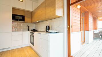 Superior Apartment (Wypoczynkowa 34A) | Private kitchenette | Coffee/tea maker, full-size fridge, stovetop, electric kettle