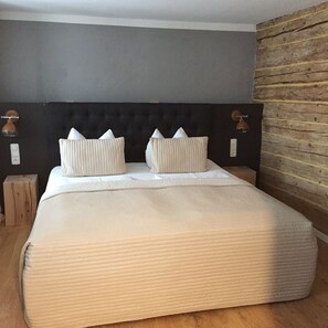 Premium bedding, desk, iron/ironing board, rollaway beds