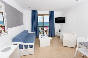 Superior Apartment, 1 Bedroom, Balcony, Sea View | Living room | Flat-screen TV