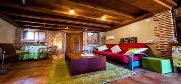 公寓, 1 间卧室 (Menta) | 起居区 | 32-英寸纯平电视 （配备数码频道）、电视