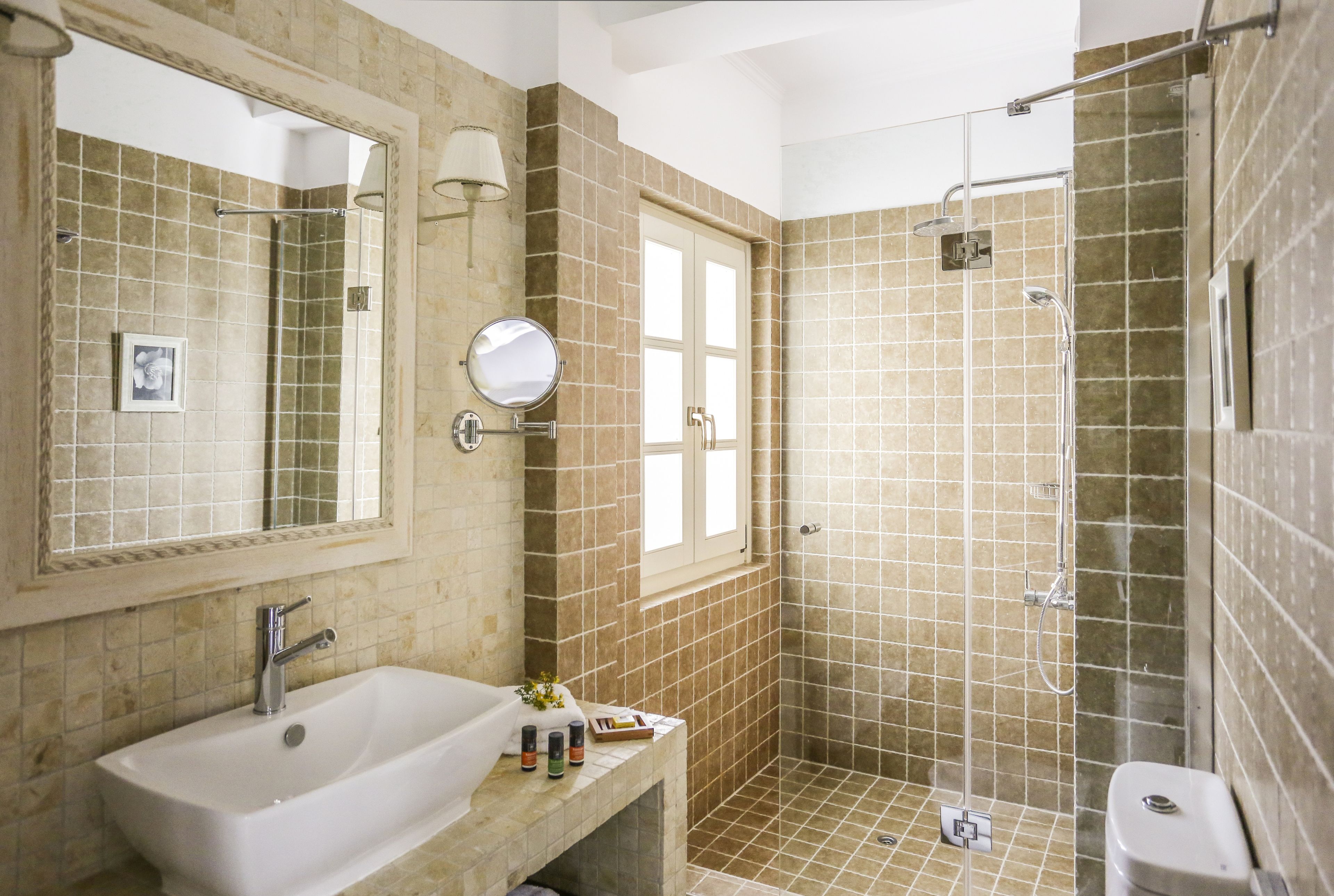 shower, designer toiletries, hair dryer, slippers