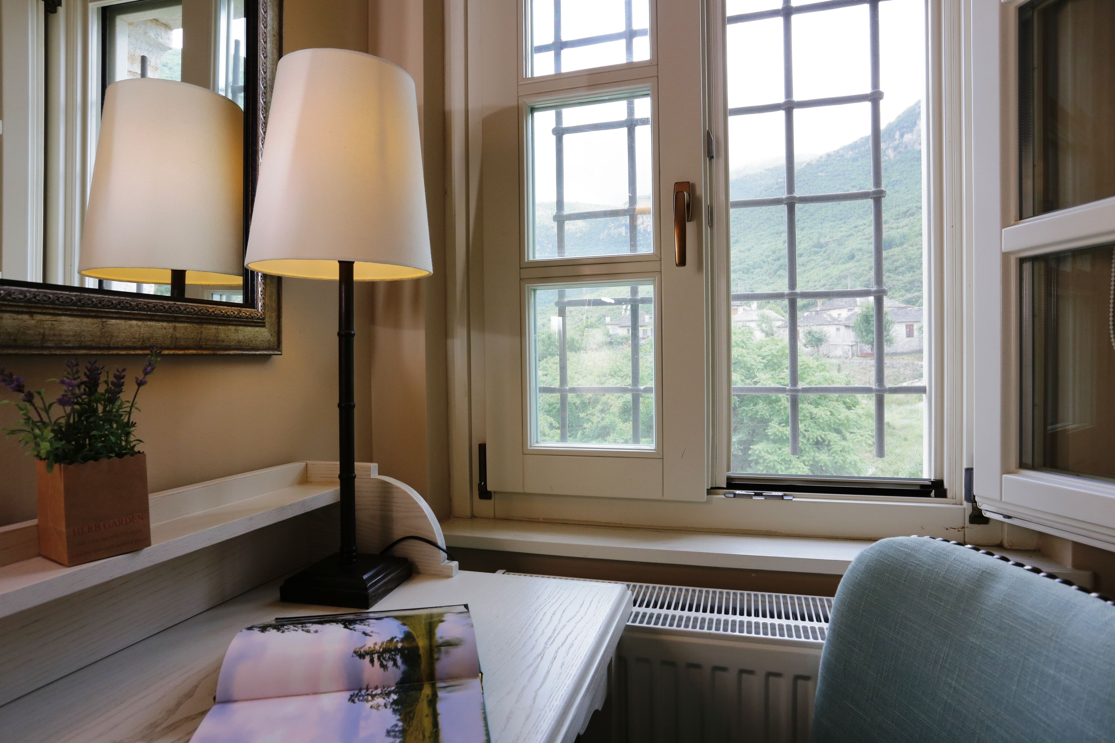 economy double room | minibar, in-room safe, individually decorated, desk