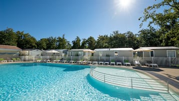 Seasonal outdoor pool, open 10:00 AM to 9:30 PM, pool umbrellas