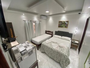 Basic Triple Room, 2 Bedrooms | 1 bedroom, desk, blackout drapes, free WiFi