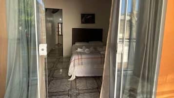 Quarto família, 2 quartos | Escrivaninha, cortinas blackout, Wi-Fi de cortesia, roupa de cama