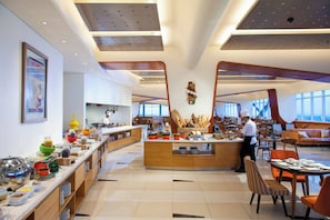 Breakfast, lunch, dinner served; international cuisine